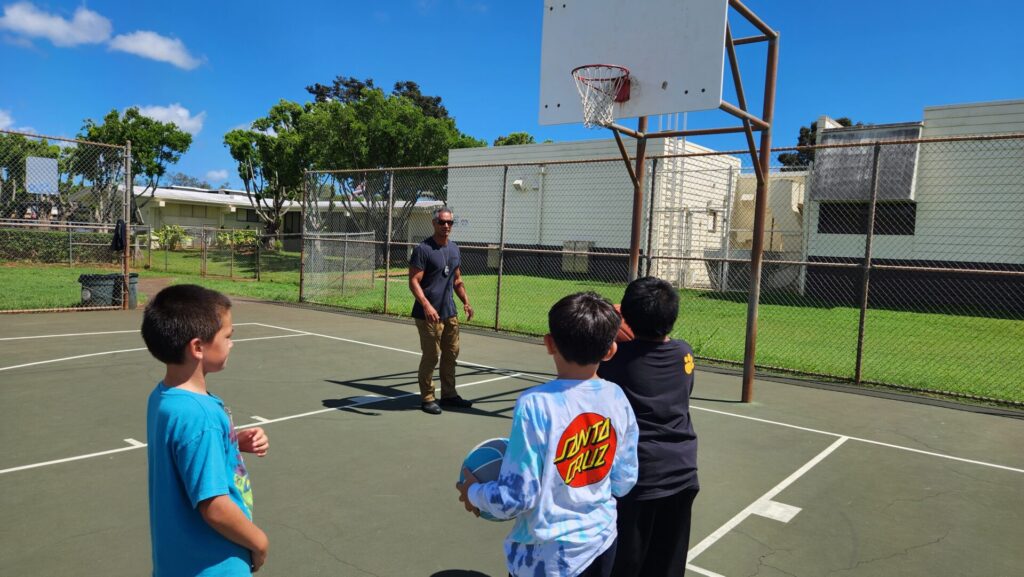 Officers mentoring students