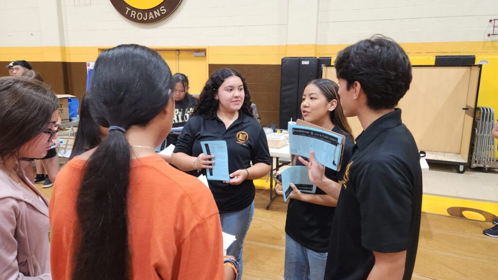 Law enforcement students promoting the law enforcement class