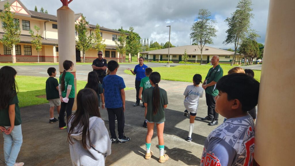 Officers mentoring students from CPO program