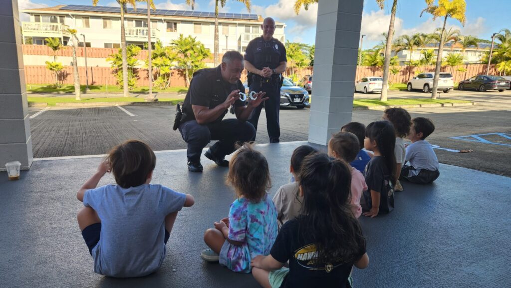 Officers telling students about what officers do