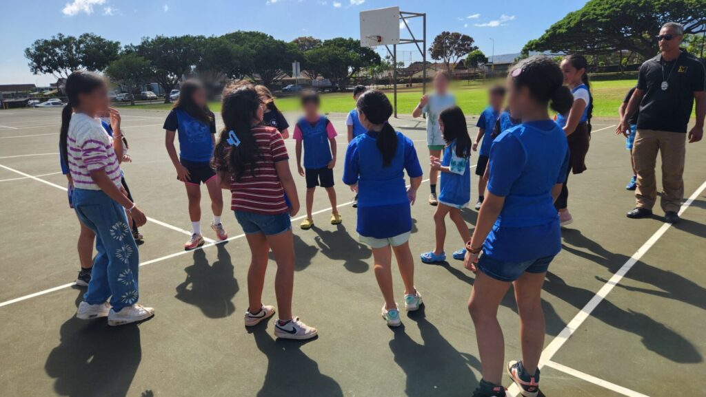 Officers mentoring students