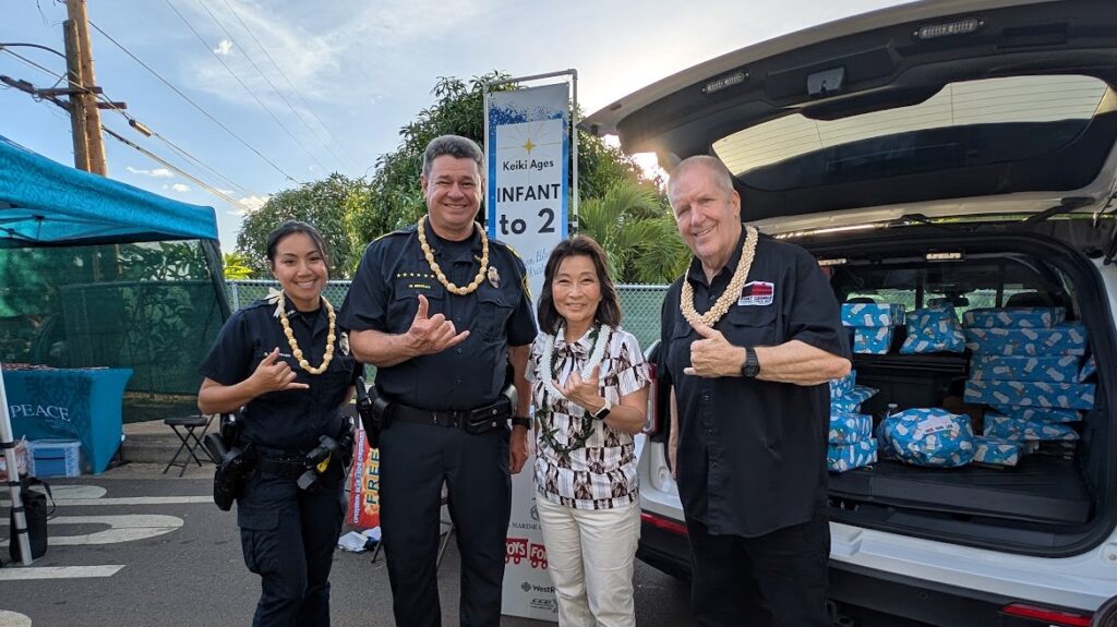 Cpt Officer Montalbo, Captain Beckley, Lt Govenor Luke and Prosecutor Alm at Operation Blue Light Christmas